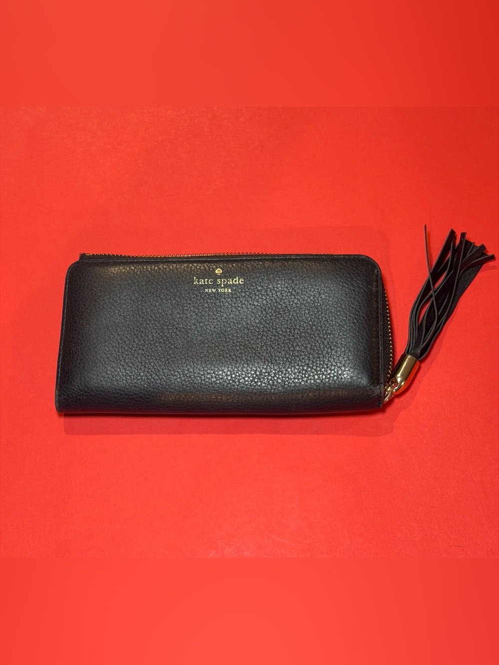 kate spade black pebbled leather zip wallet with gold logo